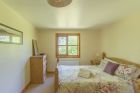 Master Bedroom Log Cabin York with Hot Tub.