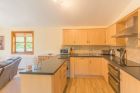 Log cabin Yorkshire showing kitchen.